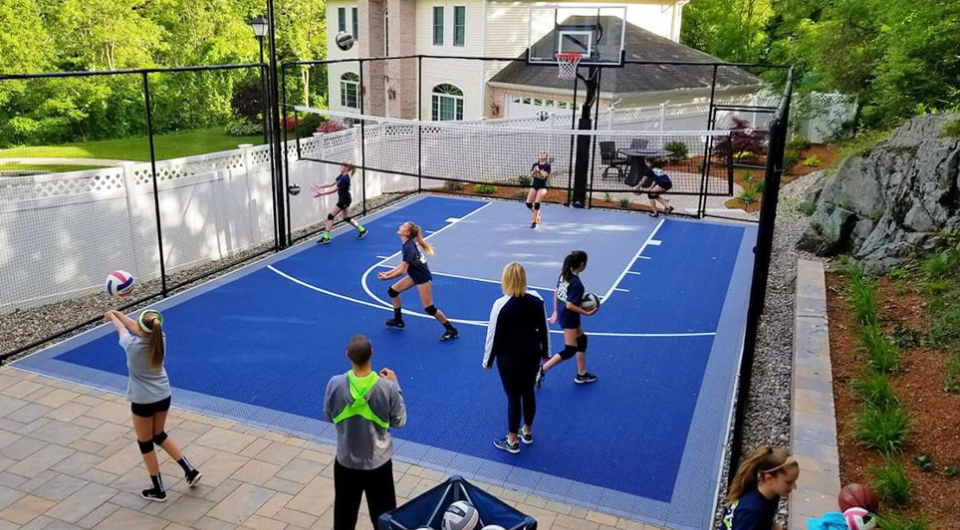 backyard volleyball court with basketball