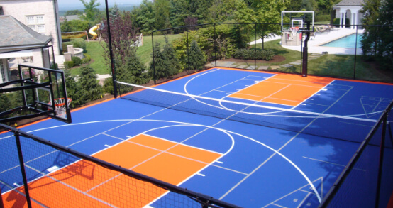 tennis court transformed into a basketball court
