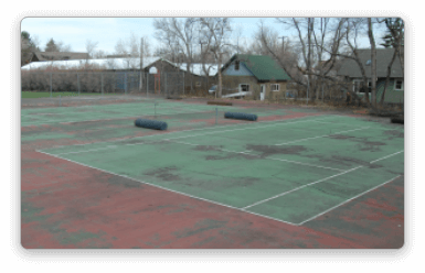 tennis court in need of resurfacing - before image