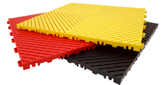 Versacourt Active Tile - stack of sample tiles in yellow, black, red