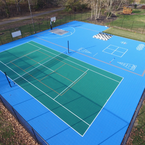 a community court featuring multiple game lines for a variety of sports