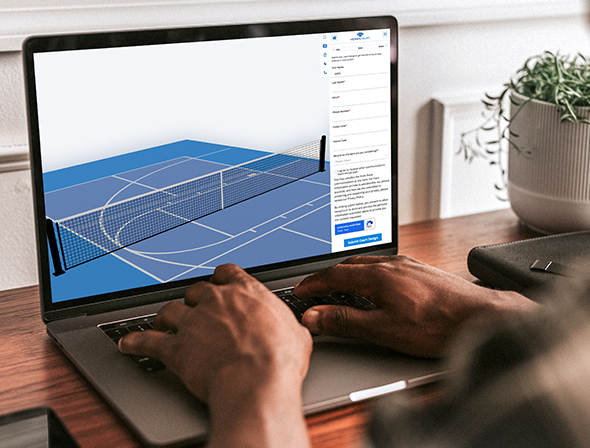 laptop open with final screen of court designer application on screen displaying option to submit design for quote