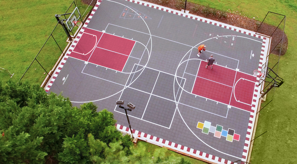 Grey and maroon multi-sport game court