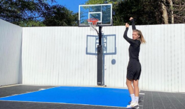 Amanda Gullickson playing on her home VersaCourt game court