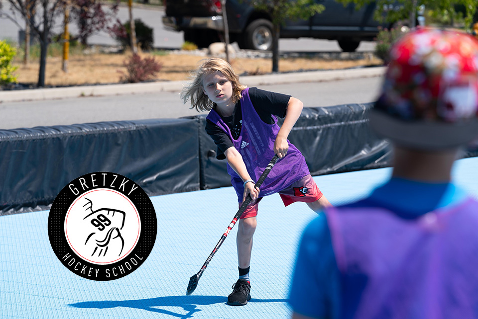 Photo of a young athlete playing hockey at Gretzky Hockey School