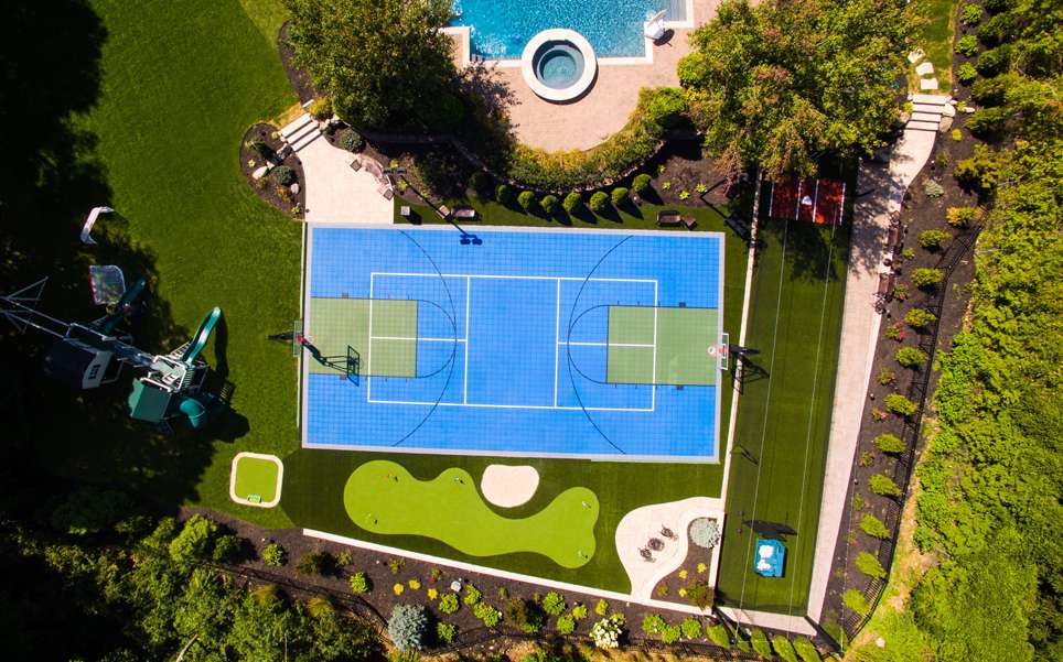 Green and Blue Multi-Sport Game Court with Basketball and Volleyball Lines