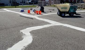 concrete surface with obvious patching and repairs