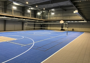 versatile court with basketball and volleyball